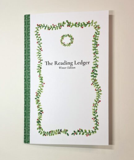 Front cover of The Reading Ledger journal on a white background.